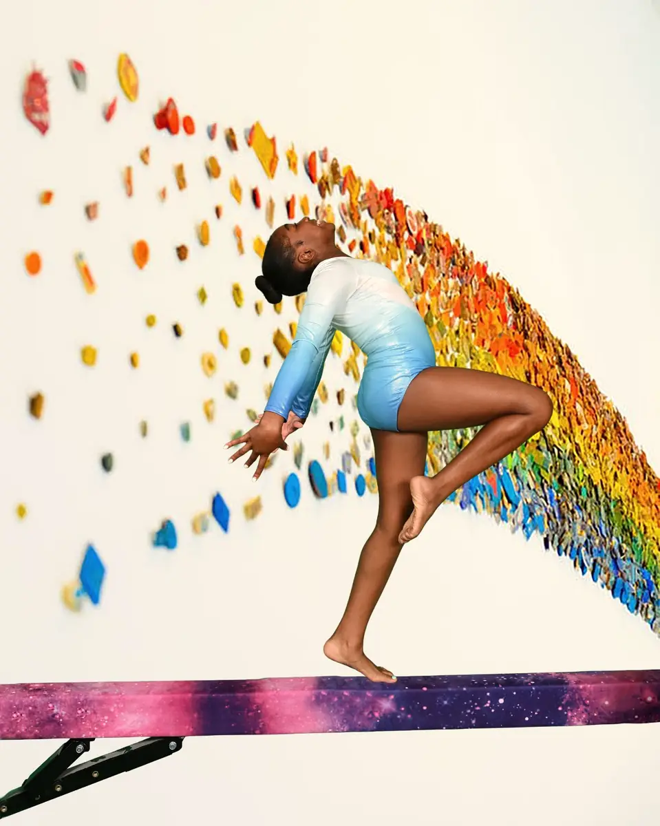 A young gymnast sticking the landing